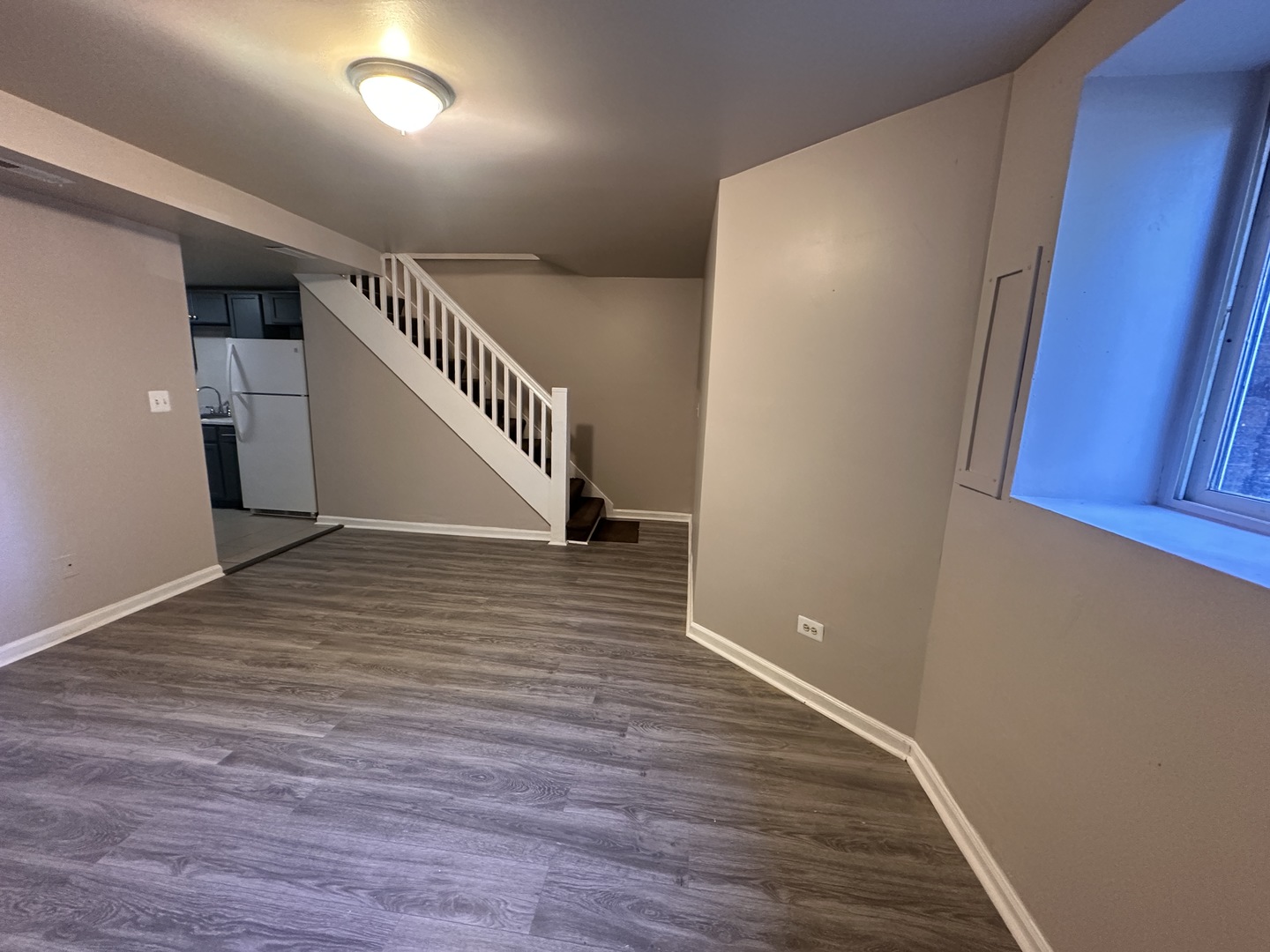 1842 South Drake Avenue Chicago, IL 60623 - Photo 18 of 47 a view of a hallway with wooden floor