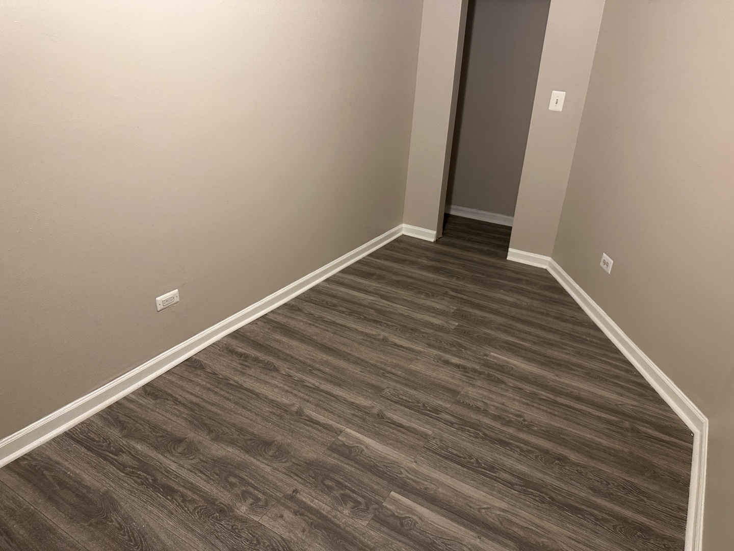 1842 South Drake Avenue Chicago, IL 60623 - Photo 30 of 47 a view of a room with wooden floor