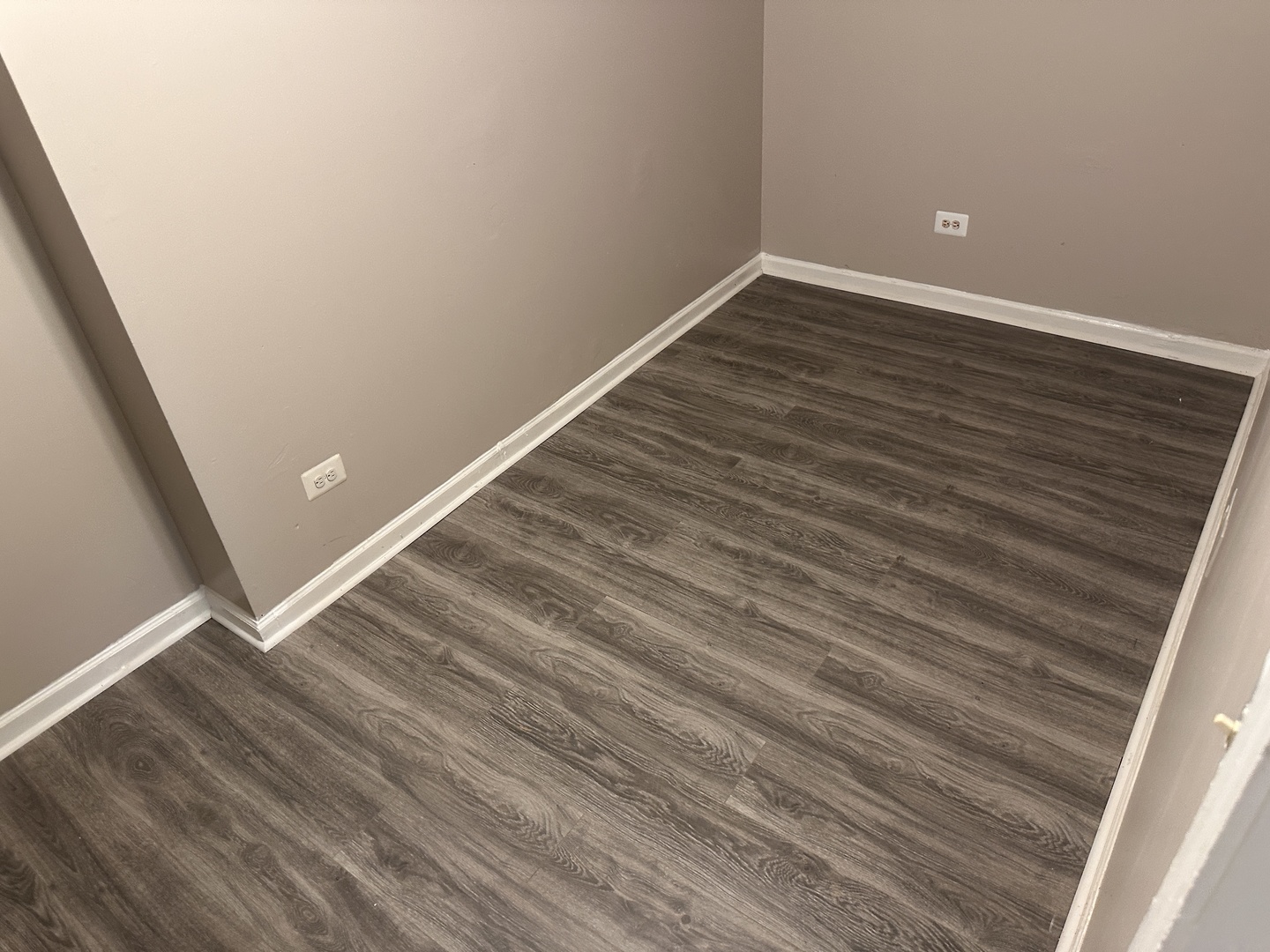 1842 South Drake Avenue Chicago, IL 60623 - Photo 34 of 47 a view of an empty room with wooden floor