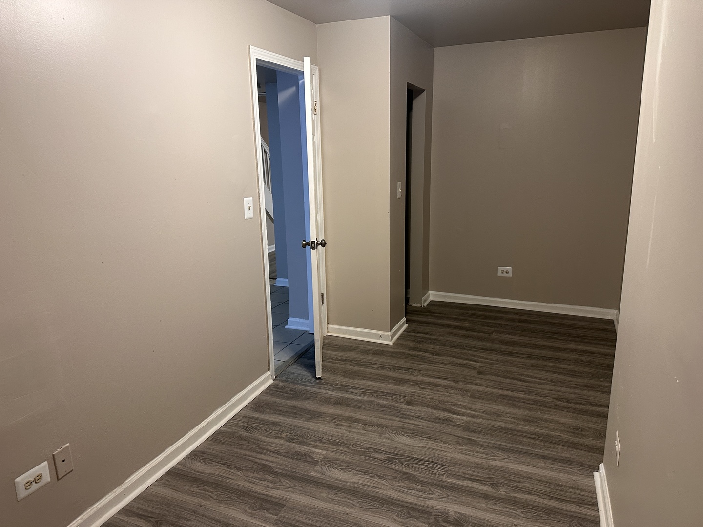 1842 South Drake Avenue Chicago, IL 60623 - Photo 35 of 47 a view of an empty room with wooden floor