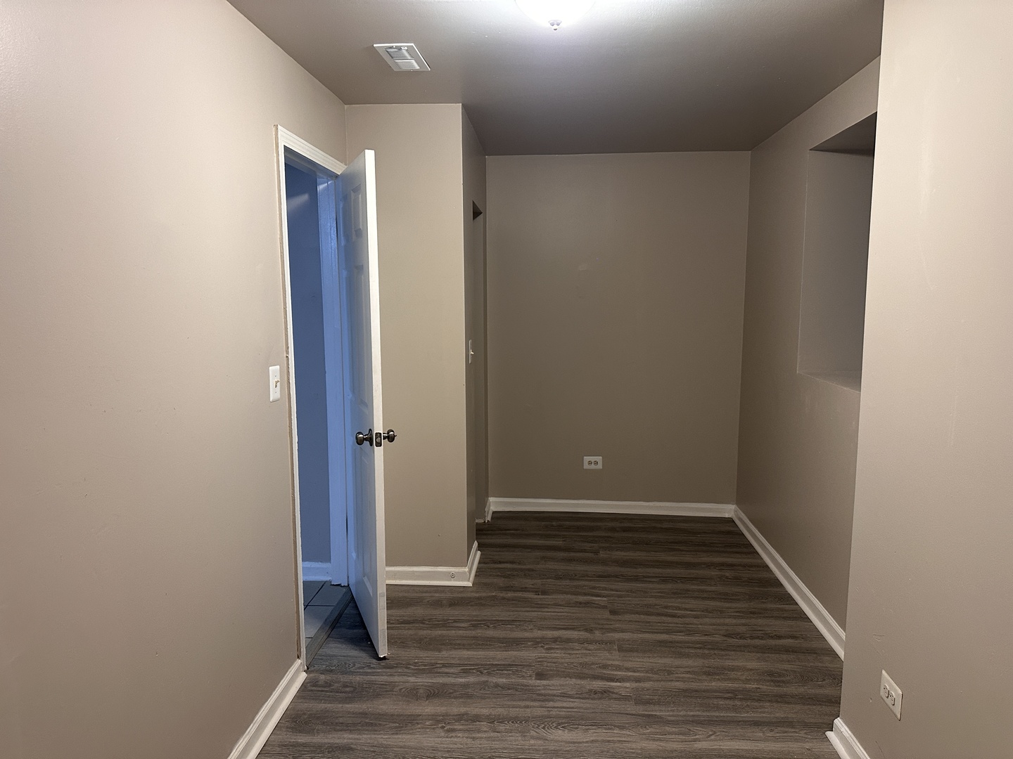 1842 South Drake Avenue Chicago, IL 60623 - Photo 36 of 47 a view of a hallway with wooden floor