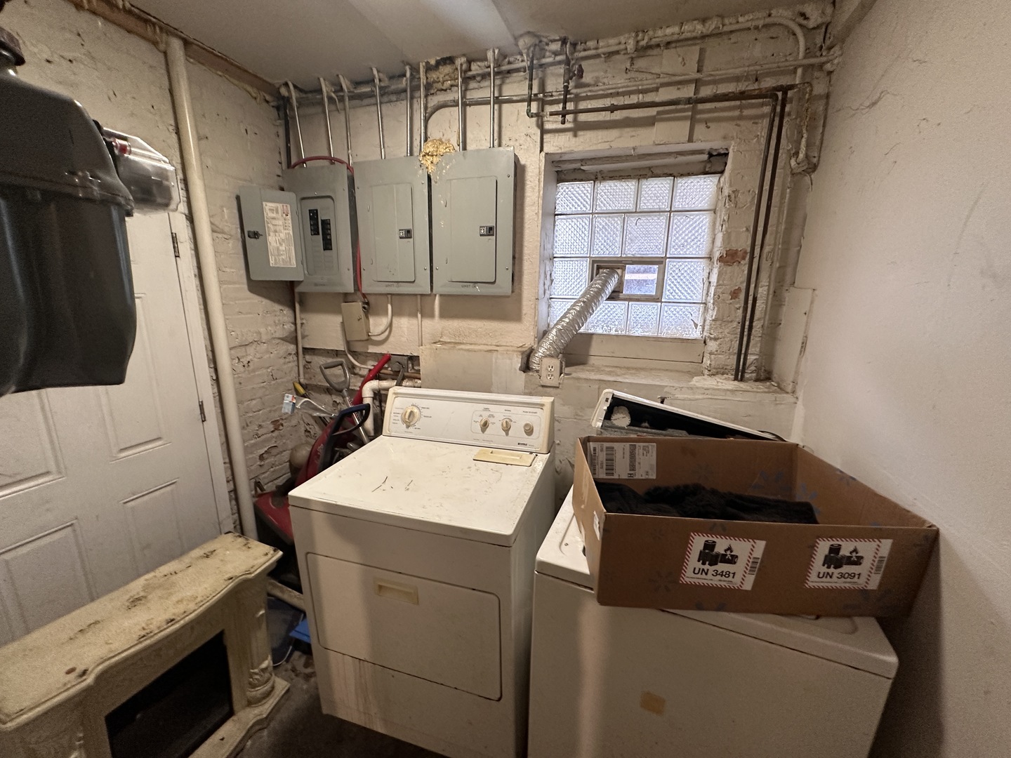 1842 South Drake Avenue Chicago, IL 60623 - Photo 40 of 47 a utility room with dryer and washer