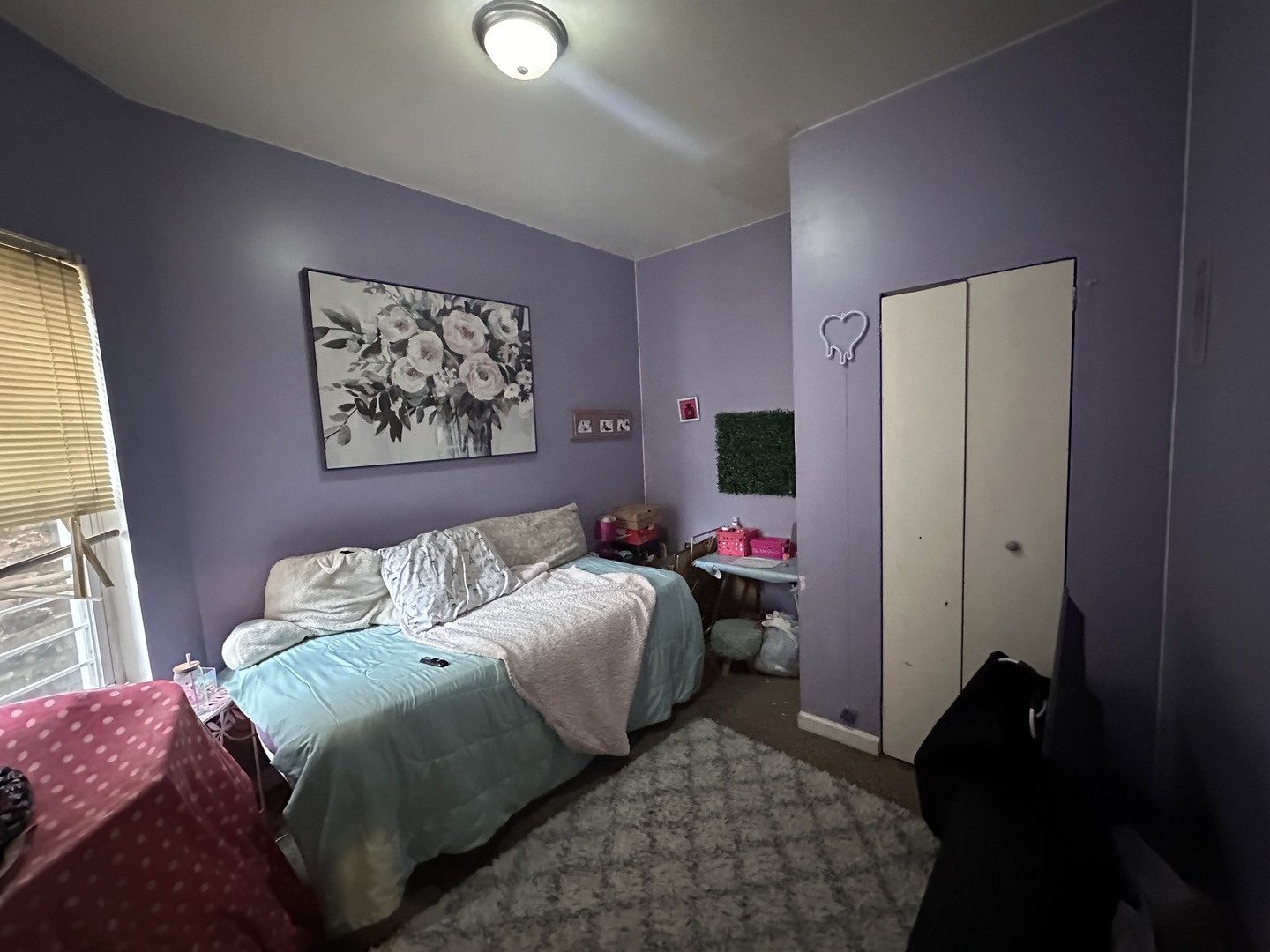 1842 South Drake Avenue Chicago, IL 60623 - Photo 9 of 47 a bedroom with a bed and a window