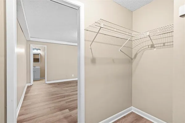a view of a room with racks on the wall