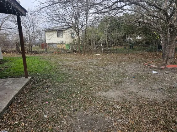 a view of yard with trees