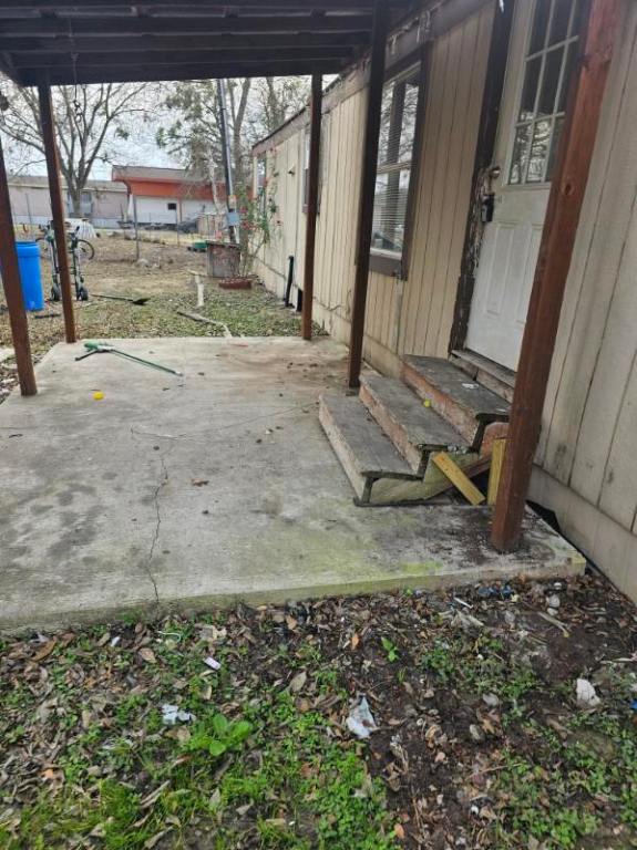 408 Greenfield Road Kyle, TX 78640 - Photo 14 of 19 a view of a backyard of a house
