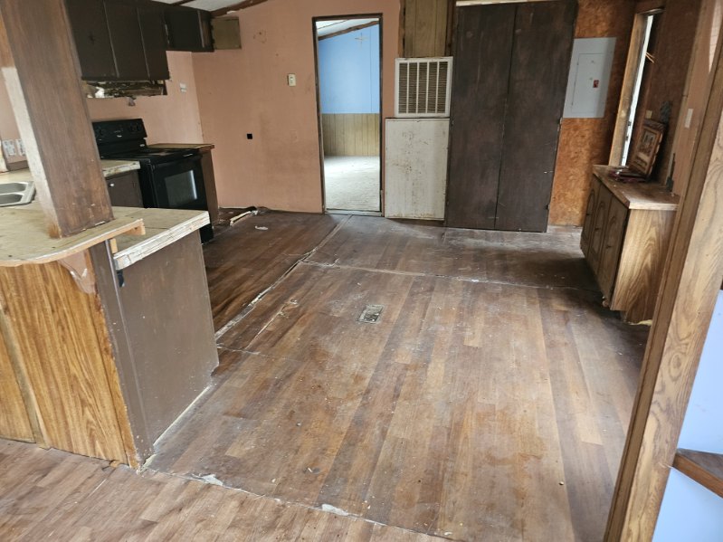 408 Greenfield Road Kyle, TX 78640 - Photo 3 of 19 a view of a kitchen from a hallway