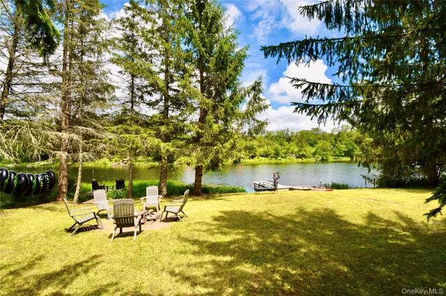 a view of a lake with a building in the background