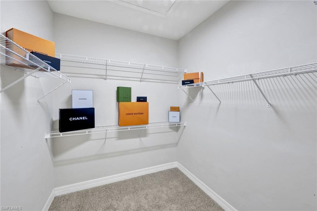 7830 Twin Eagle Lane Fort Myers, FL 33912 - Photo 18 of 31 a utility room with dryer and washer