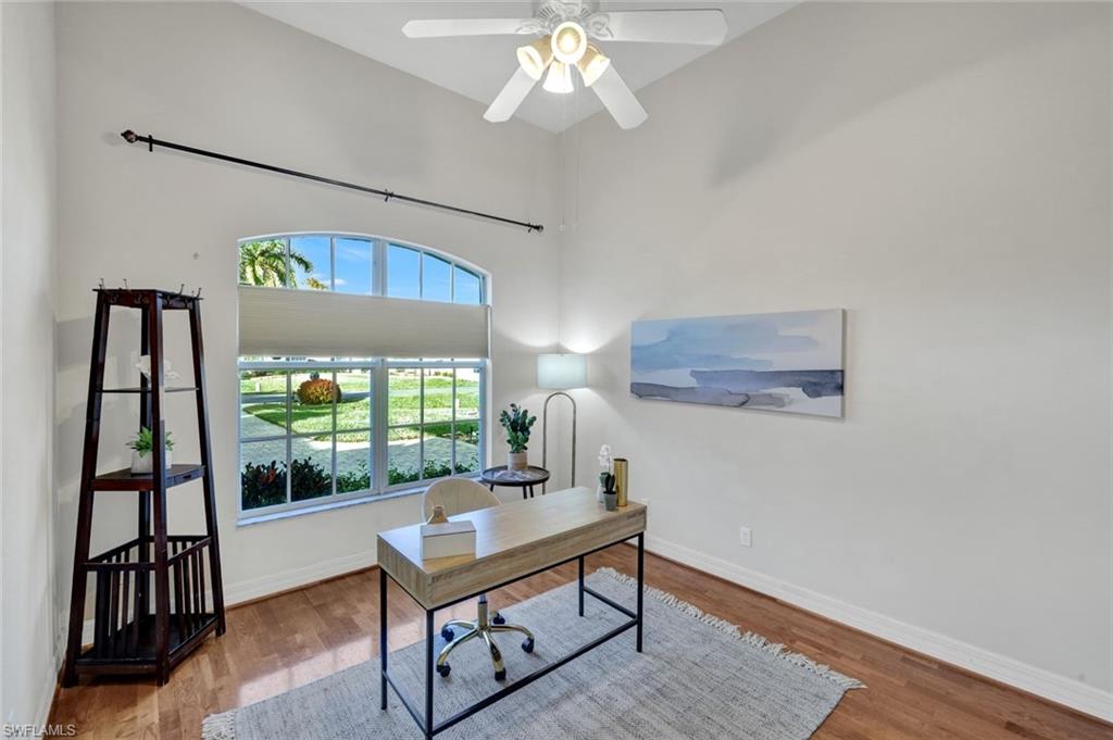 7830 Twin Eagle Lane Fort Myers, FL 33912 - Photo 24 of 31 a view of a workspace with furniture and a window