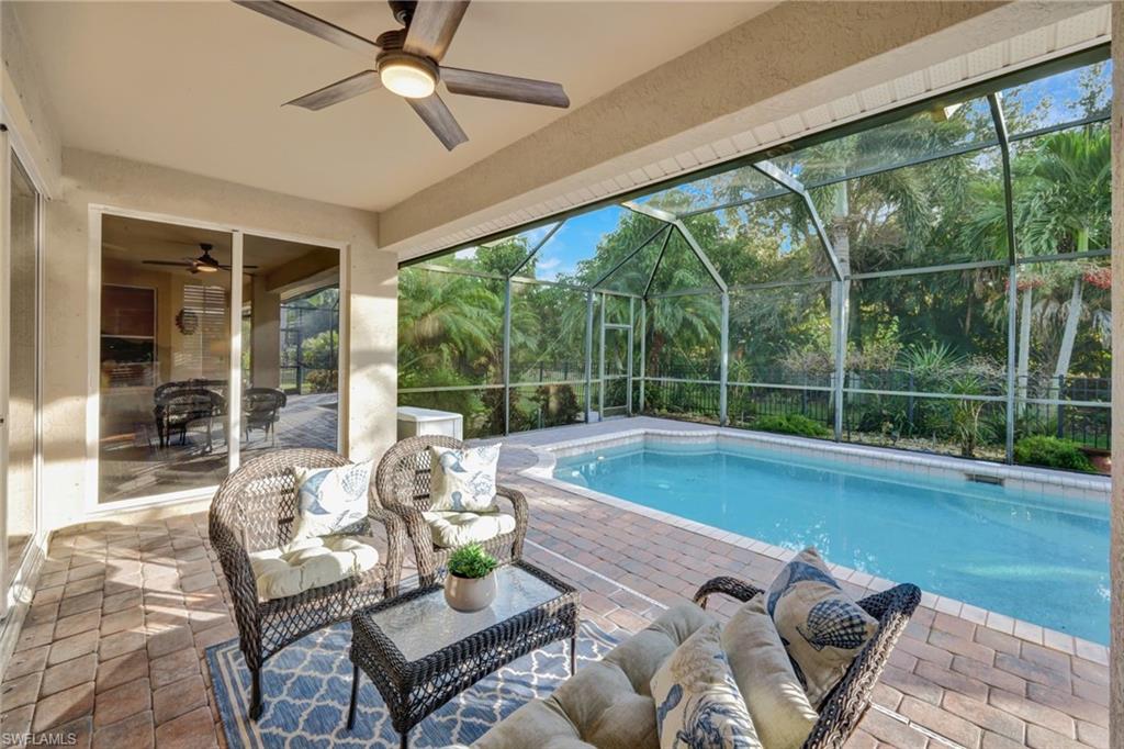 7830 Twin Eagle Lane Fort Myers, FL 33912 - Photo 25 of 31 a living room with furniture and a large window