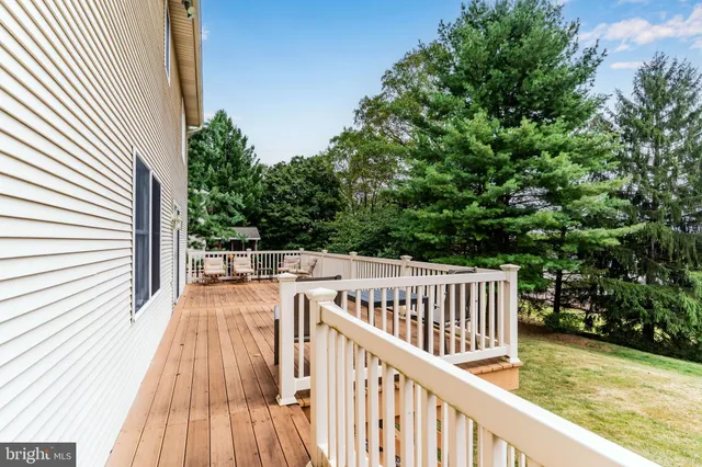 a roof deck view with a seating space