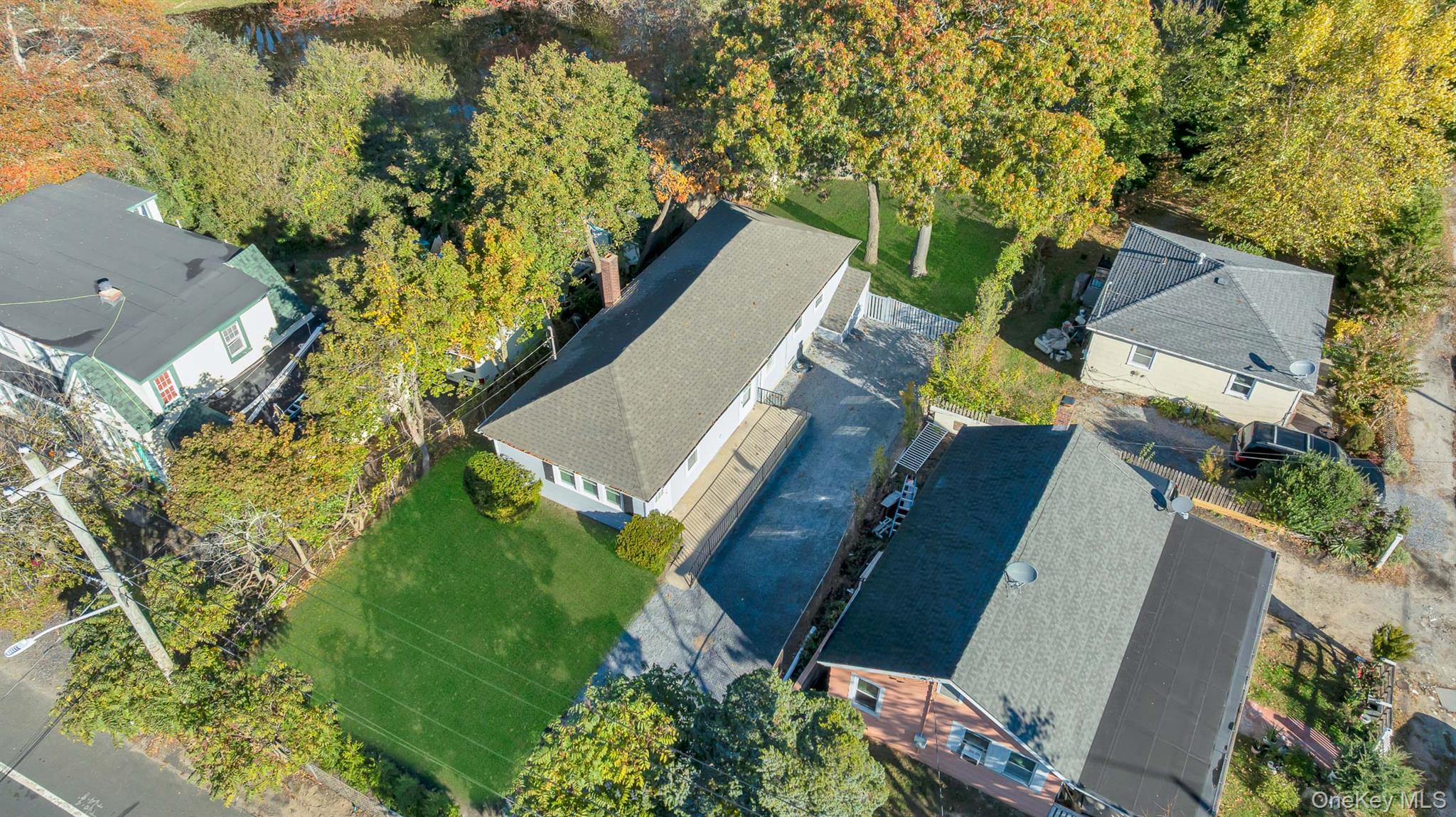 860 Flanders Road Flanders, NY 11901 - Photo 29 of 31 an aerial view of a house with a yard