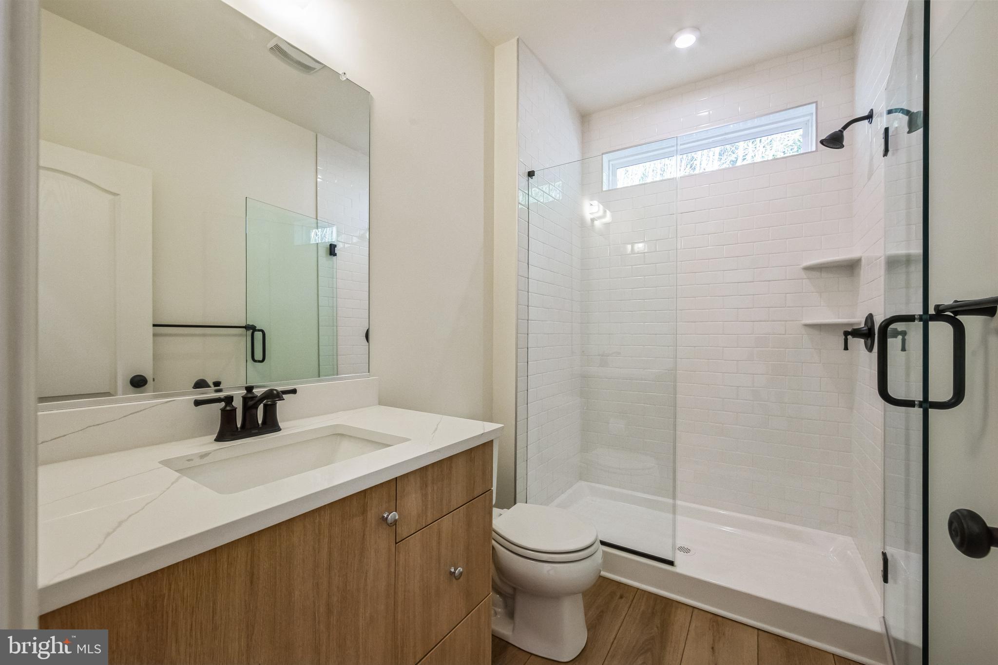 3455 B Durham Road Doylestown, PA 18902 - Photo 12 of 17 a bathroom with a sink a toilet and shower