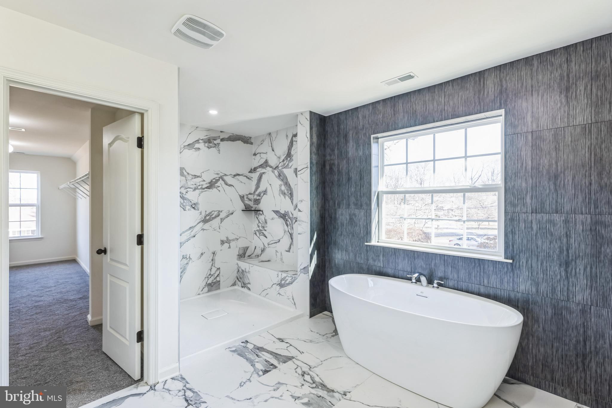 3455 B Durham Road Doylestown, PA 18902 - Photo 13 of 17 a bathroom with a bathtub sink and toilet