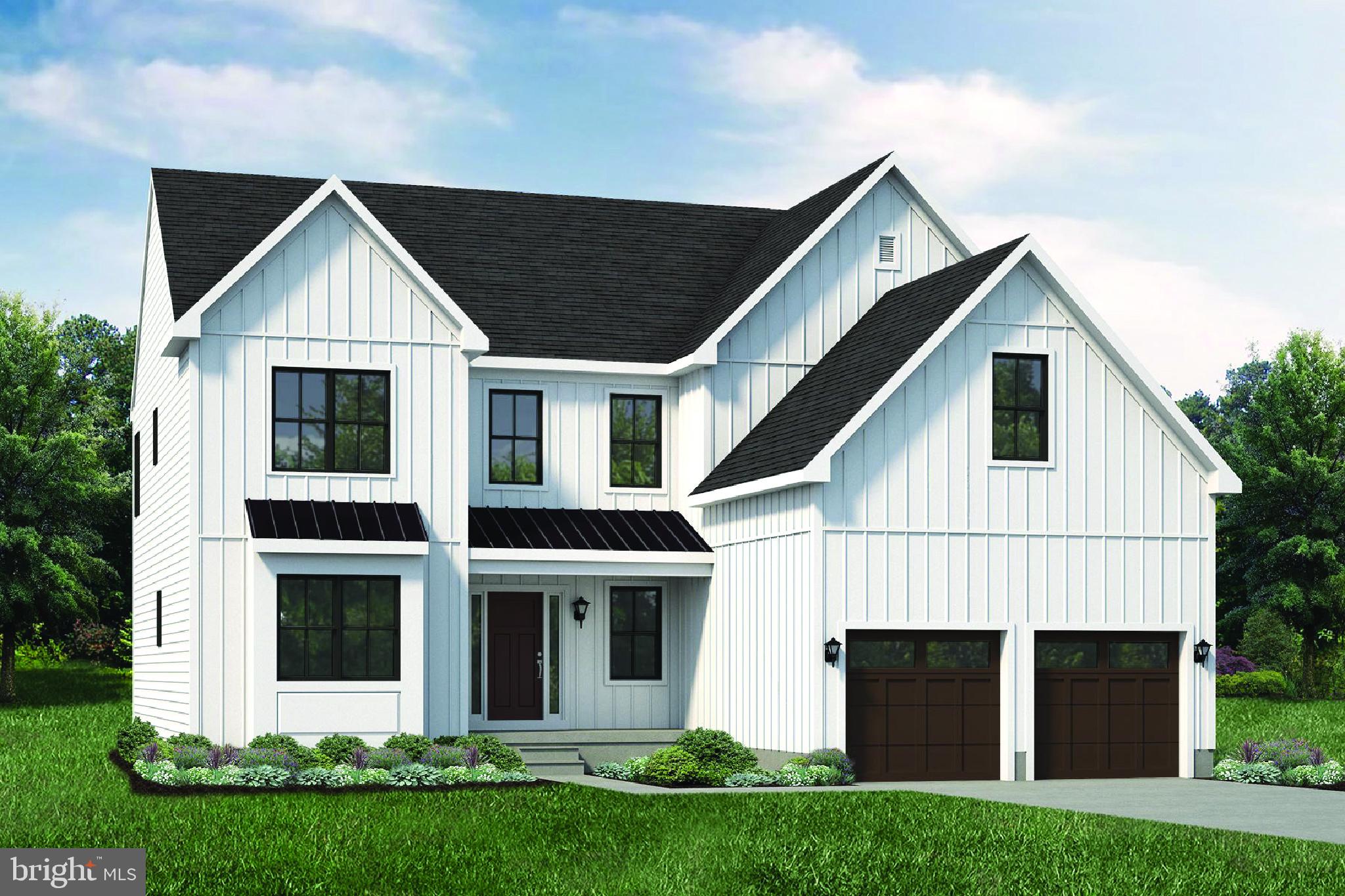 3455 B Durham Road Doylestown, PA 18902 - Photo 2 of 17 a front view of a house with a yard and garage