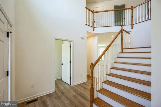 a view of entryway with wooden floor