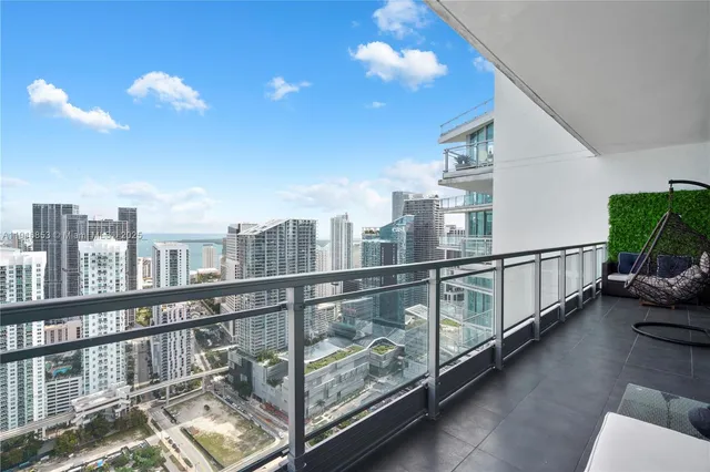 a view of a city with tall buildings