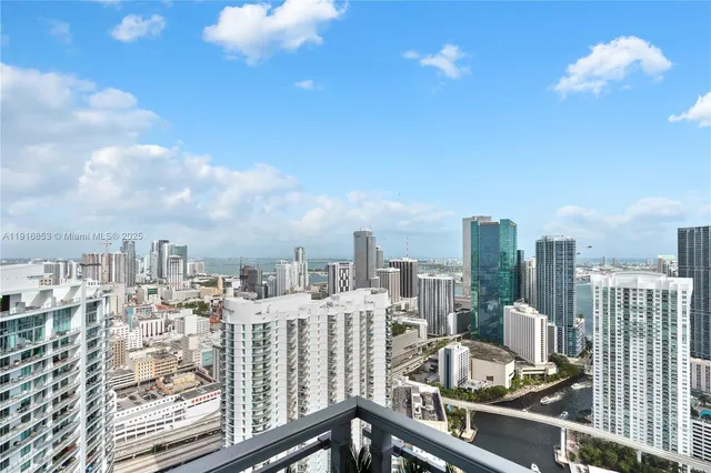 a view of a city with tall buildings