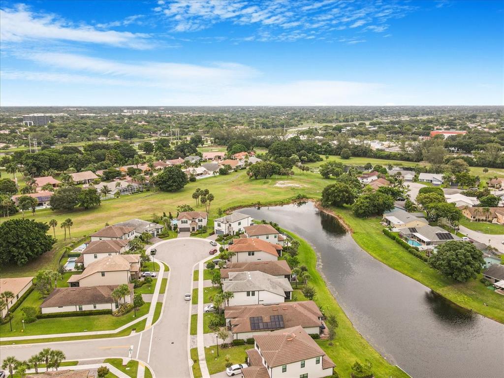 8258 Northwest 79th Avenue Tamarac, FL 33321 - Photo 11 of 38 an aerial view of residential houses with outdoor space