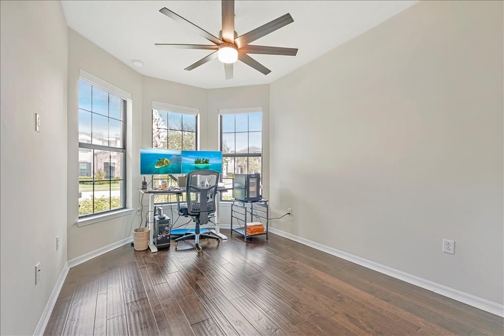 8258 Northwest 79th Avenue Tamarac, FL 33321 - Photo 19 of 38 a view of a livingroom with lounge chair and a window