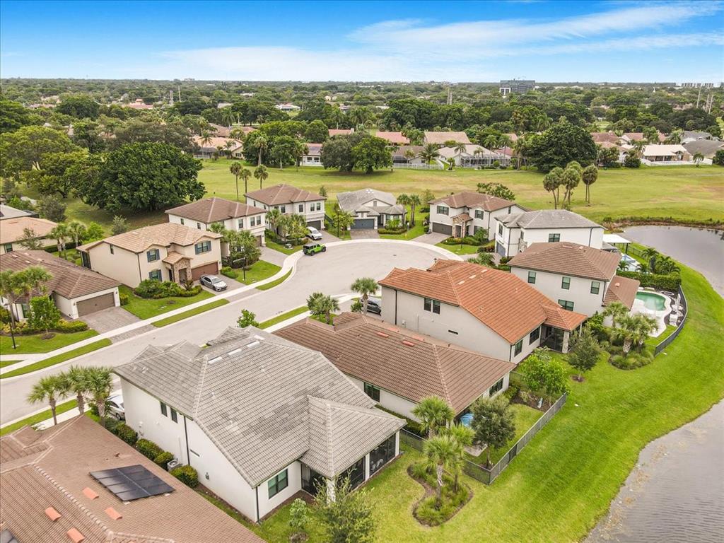 8258 Northwest 79th Avenue Tamarac, FL 33321 - Photo 2 of 38 an aerial view of residential houses with outdoor space and ocean view