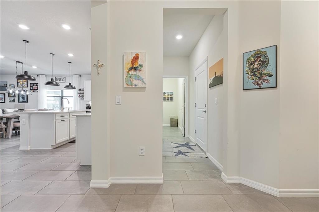 8258 Northwest 79th Avenue Tamarac, FL 33321 - Photo 21 of 38 a view of a kitchen with refrigerator and cabinets