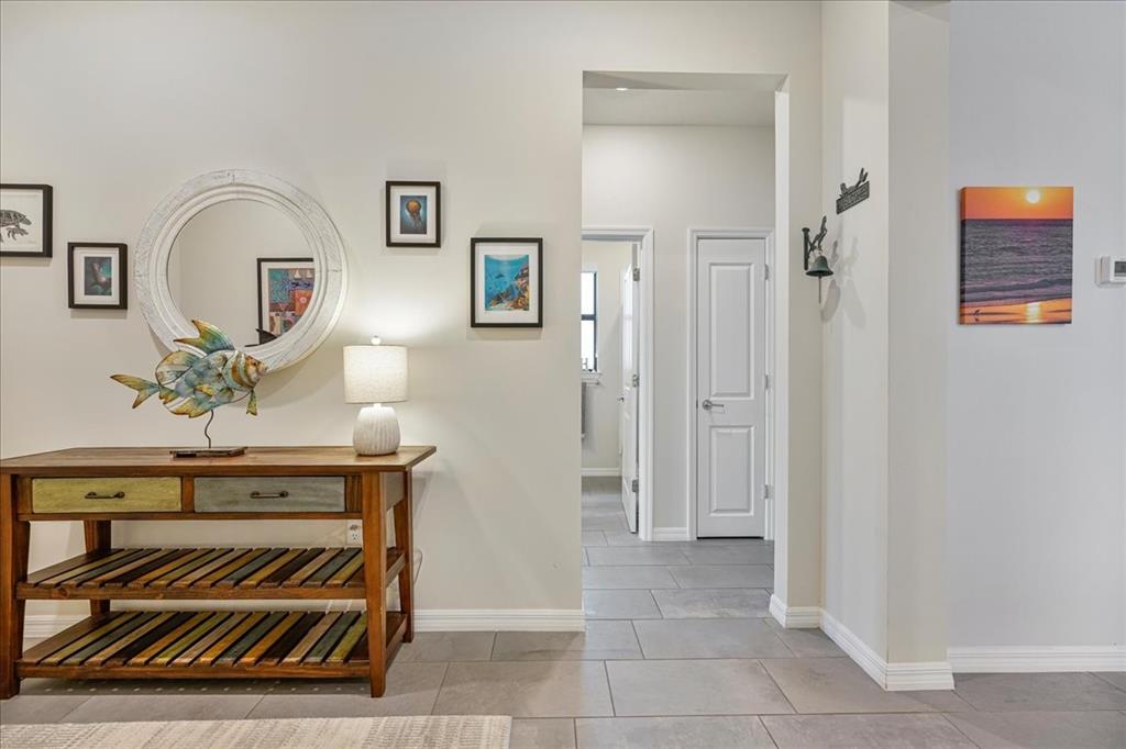 8258 Northwest 79th Avenue Tamarac, FL 33321 - Photo 22 of 38 a view of hall way with mirror