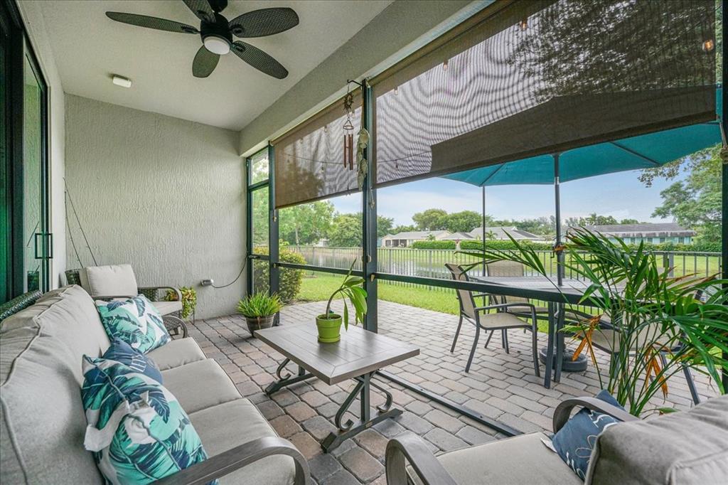 8258 Northwest 79th Avenue Tamarac, FL 33321 - Photo 30 of 38 a view of a dining room with furniture window and outside view