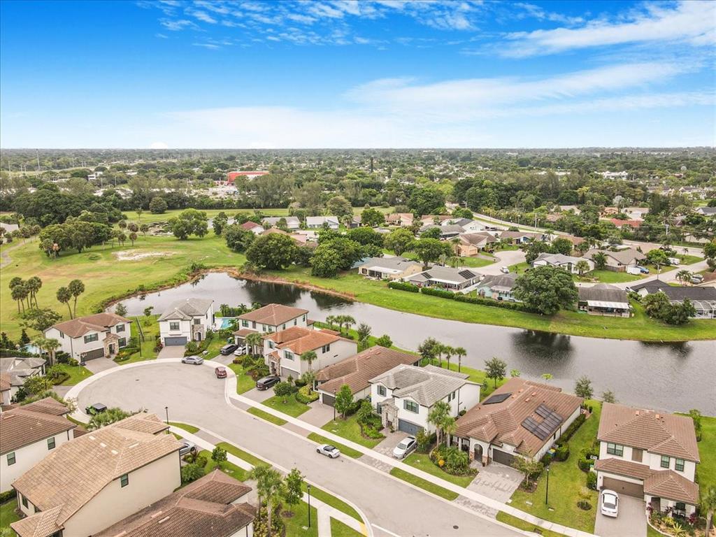 8258 Northwest 79th Avenue Tamarac, FL 33321 - Photo 7 of 38 an aerial view of a city with lake view