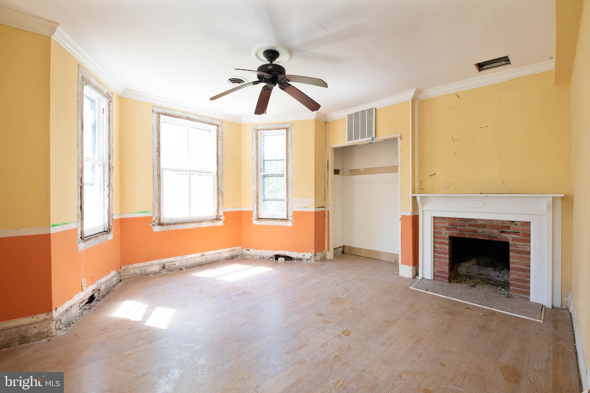 600 Sudbrook Road Baltimore, MD 21208 - Photo 24 of 49 Large sun filled room w/ fireplace