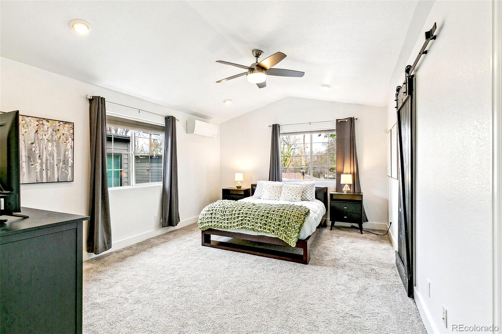 4530 Quitman Street Denver, CO 80212 - Photo 25 of 50 a living room with a bed furniture and a window