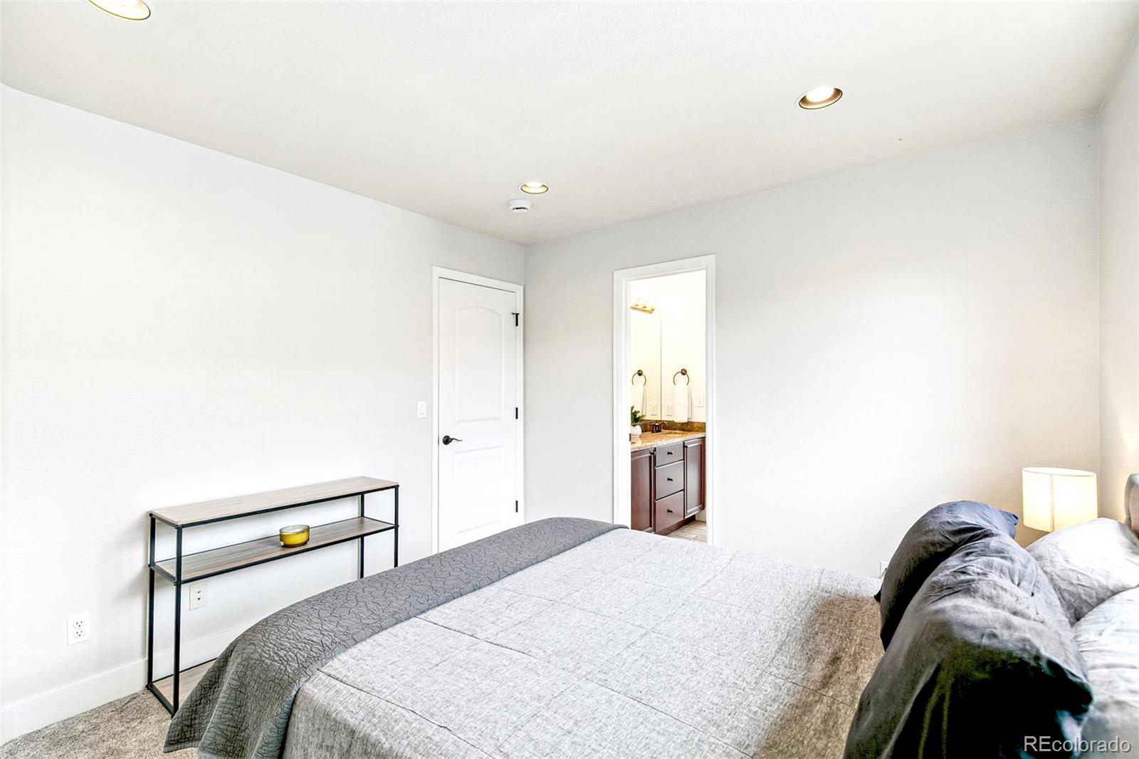 4530 Quitman Street Denver, CO 80212 - Photo 31 of 50 a bedroom with a bed and a window