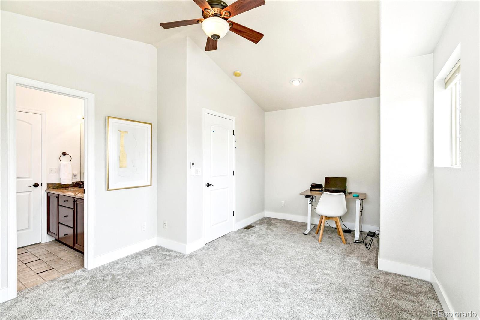 4530 Quitman Street Denver, CO 80212 - Photo 34 of 50 a view of a hallway with workspace and a window