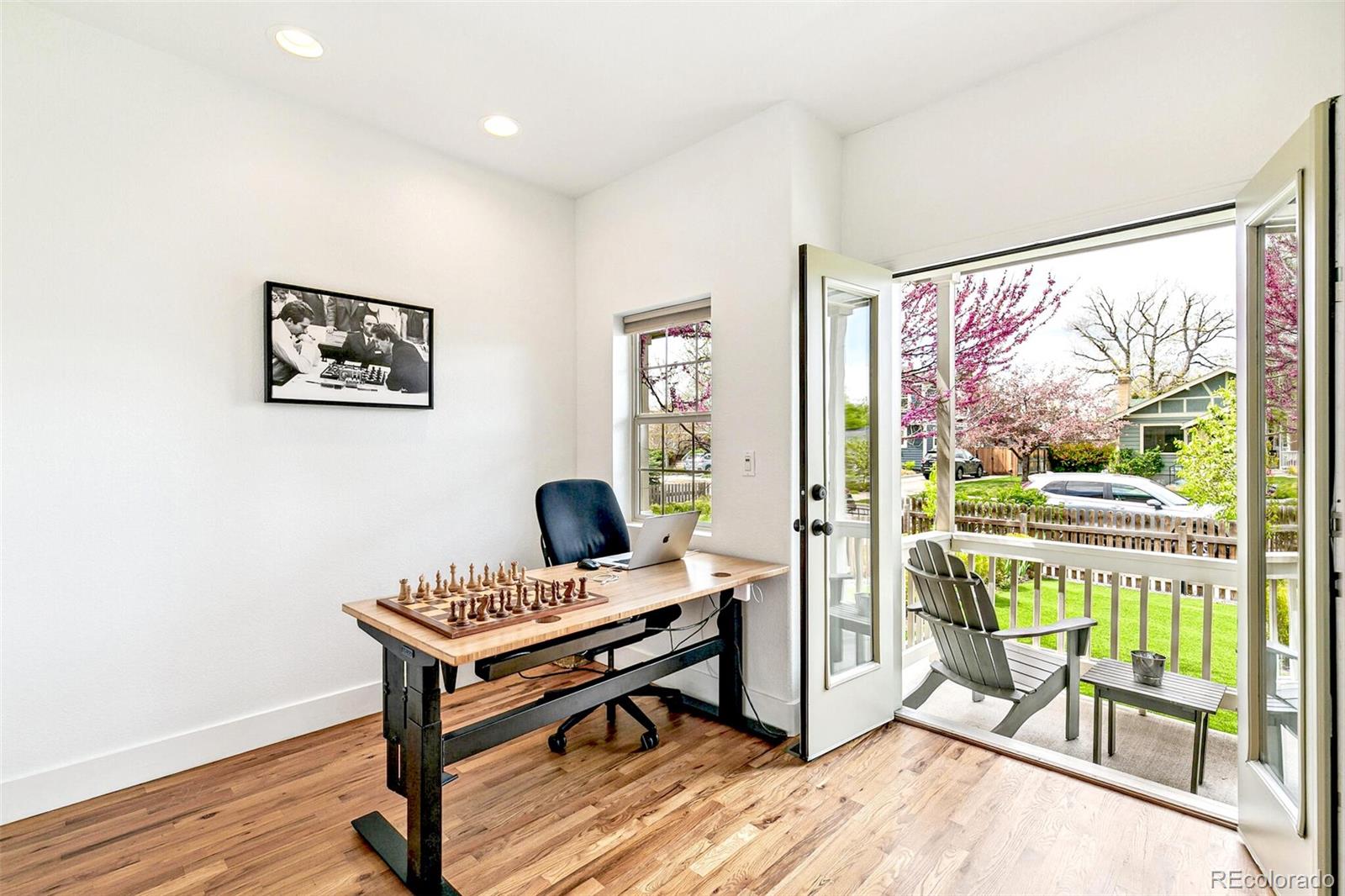 4530 Quitman Street Denver, CO 80212 - Photo 8 of 50 a living room with furniture and a floor to ceiling window