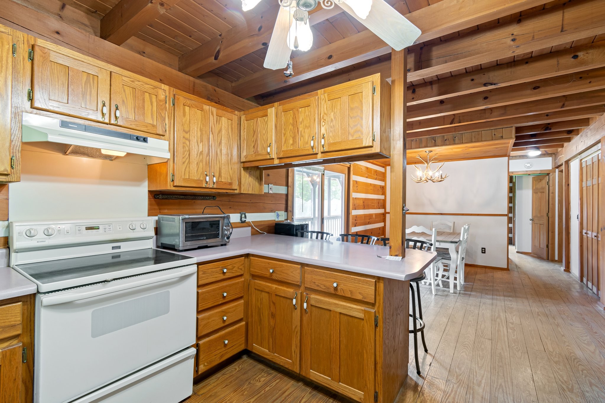 1321 Maddox Road Centerville, TN 37033 - Photo 50 of 70 a kitchen with stainless steel appliances granite countertop a sink a stove and cabinets