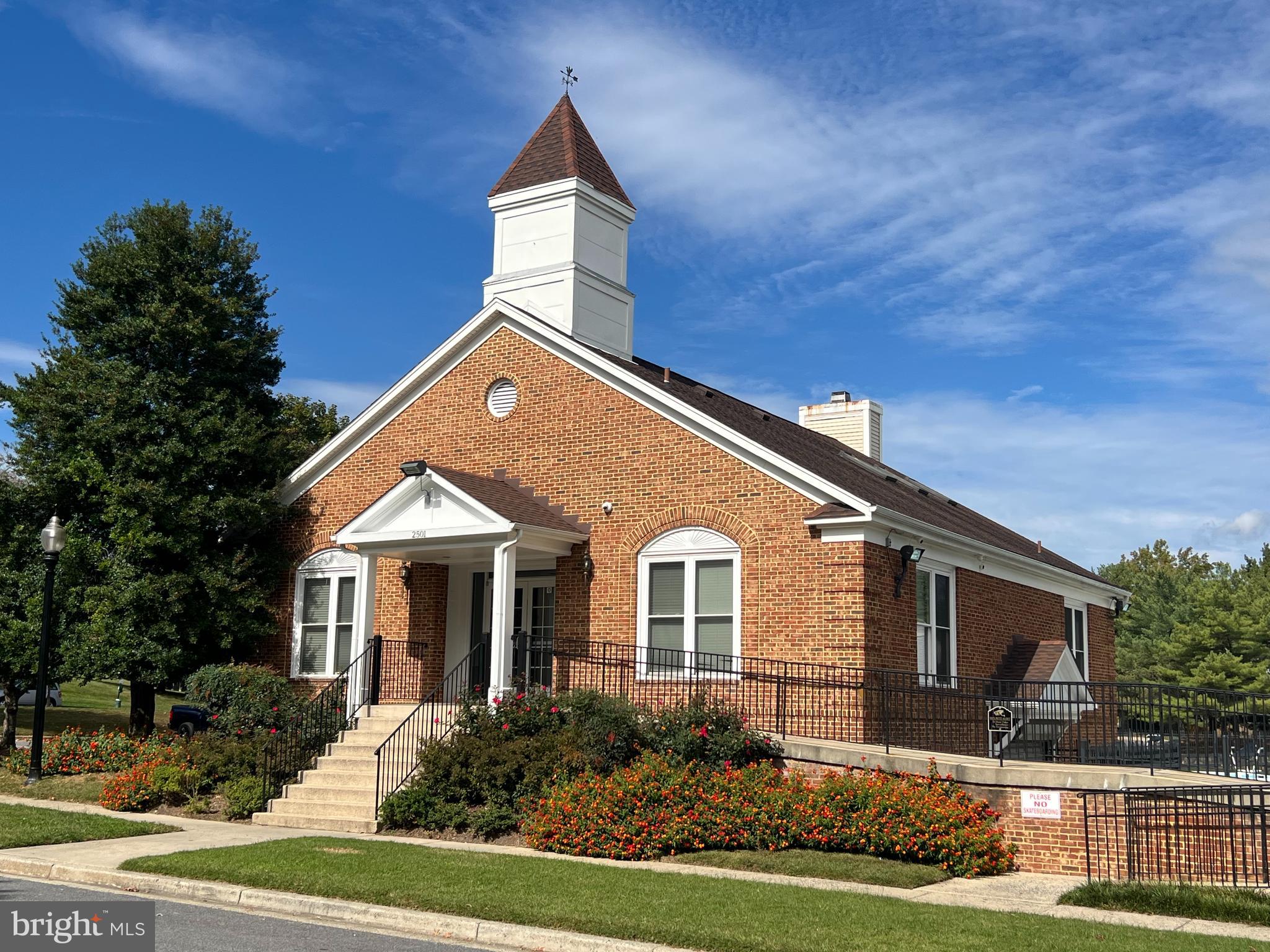 14101 Valleyfield Drive, Unit 114 Silver Spring, MD 20906 - Photo 26 of 26 a front view of a house with a yard