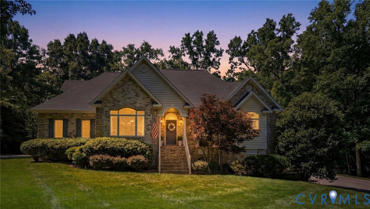 12123 Deer Ridge Court Ashland, VA 23005 - Photo 2 of 63 a front view of a house with garden