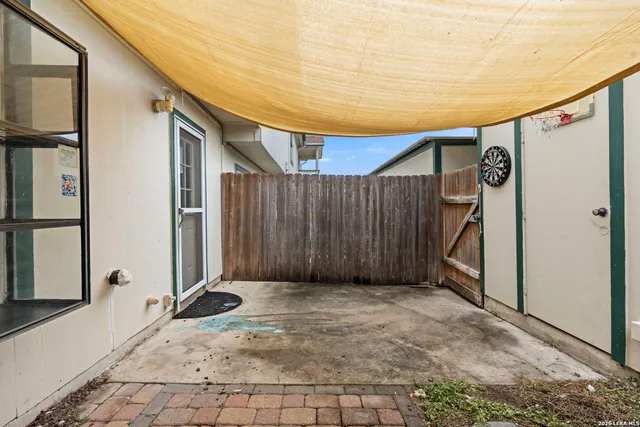 a view of a back yard of the house