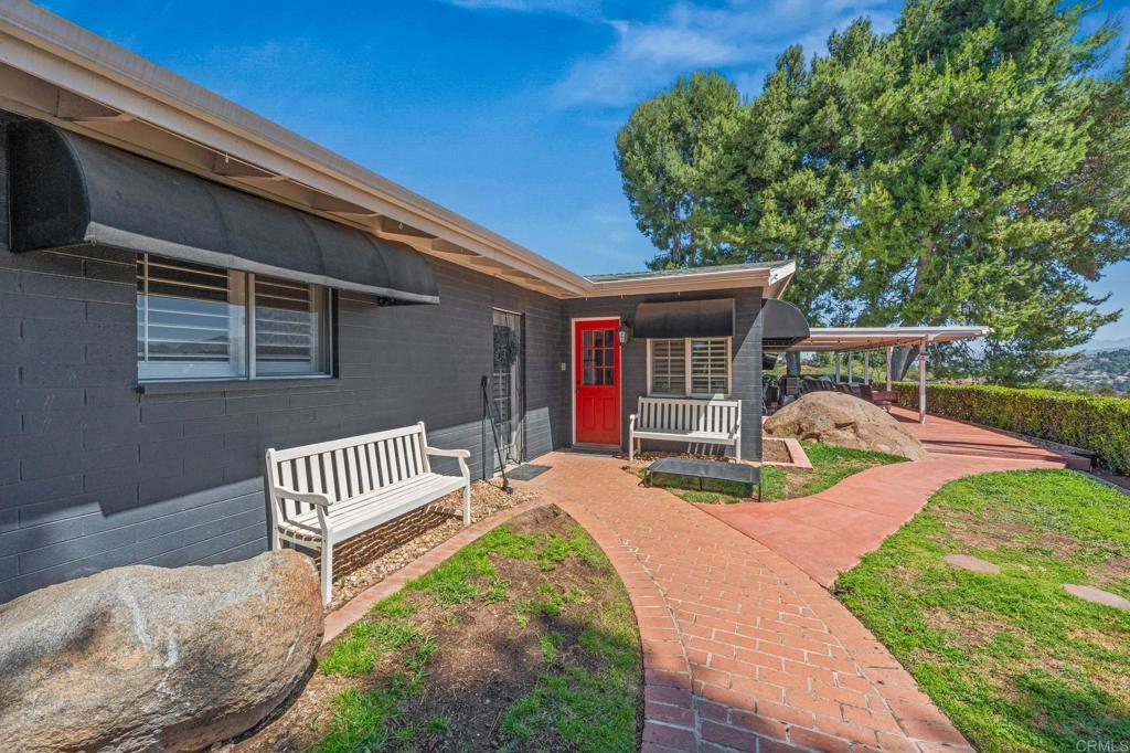 1308 Sundale Road El Cajon, CA 92019 - Photo 12 of 70 a view of a house with backyard and porch