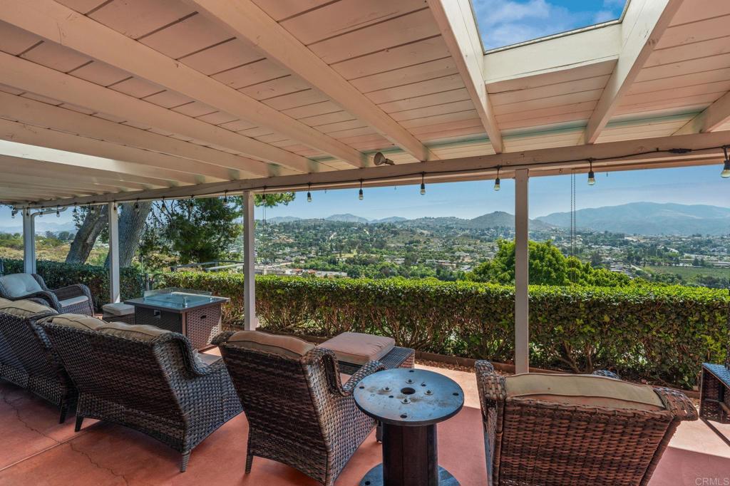 1308 Sundale Road El Cajon, CA 92019 - Photo 14 of 70 a view of a patio with a table chairs and a table