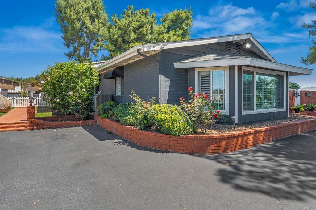 1308 Sundale Road El Cajon, CA 92019 - Photo 3 of 70 front view of a house with a yard