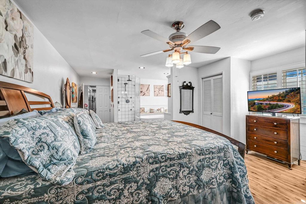1308 Sundale Road El Cajon, CA 92019 - Photo 36 of 70 a bedroom with a bed and a walk in closet