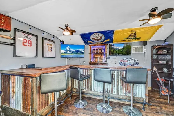a view of a kitchen and dining area