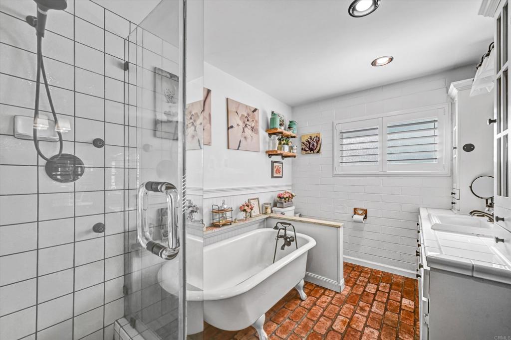 1308 Sundale Road El Cajon, CA 92019 - Photo 37 of 70 a bathroom with a sink toilet and shower