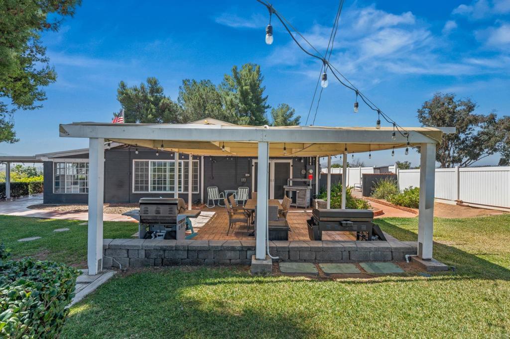 1308 Sundale Road El Cajon, CA 92019 - Photo 38 of 70 a view of a house with backyard porch and sitting area