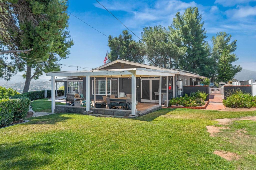 1308 Sundale Road El Cajon, CA 92019 - Photo 40 of 70 a front view of a house with garden