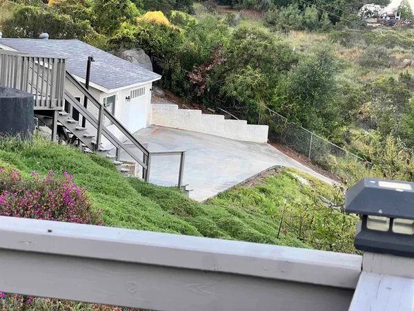a view of a terrace with a garden