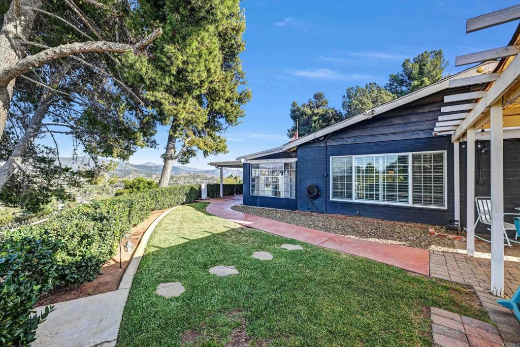 1308 Sundale Road El Cajon, CA 92019 - Photo 47 of 70 a front view of a house with a yard