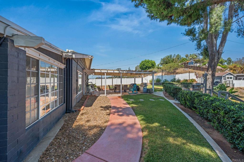 1308 Sundale Road El Cajon, CA 92019 - Photo 48 of 70 a view of a porch with a yard